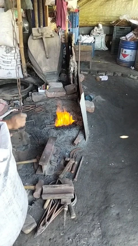 Traditional Blacksmith Forging a Metal Tool on an Anvil. Stock Footage 323540163