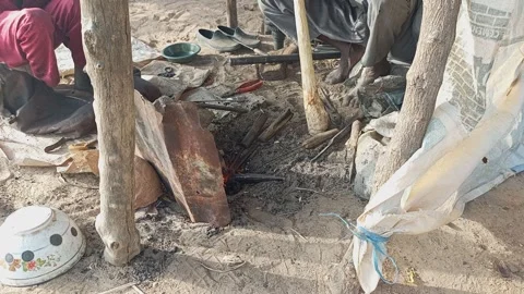 Traditional Blacksmith Making Axe In African Market Kano Nigeria 動画素材 323942595
