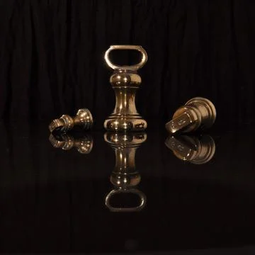 Traditional brass weights Stock Photos
