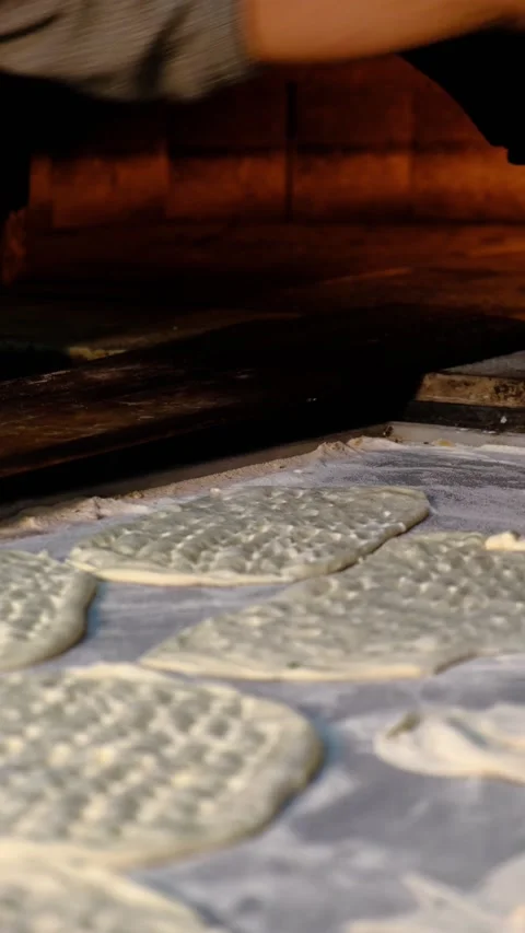 Traditional bread making in stone oven Stock Footage 228066592
