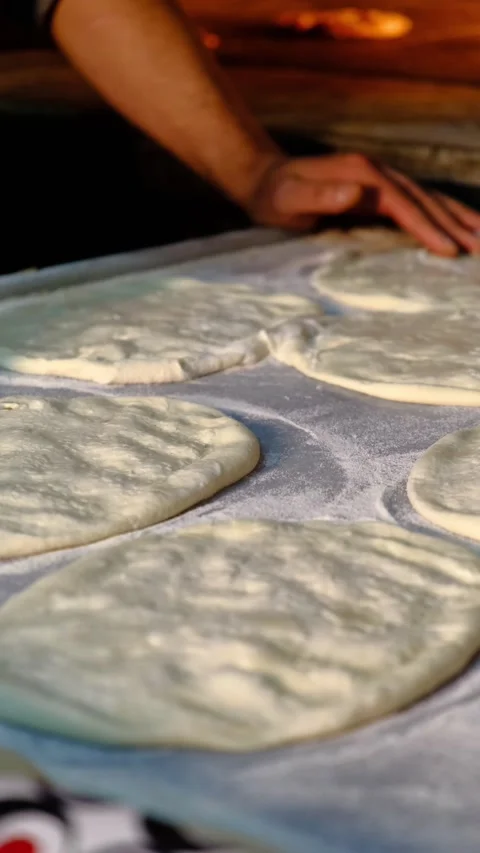Traditional bread making in stone oven Stock Footage 228067364