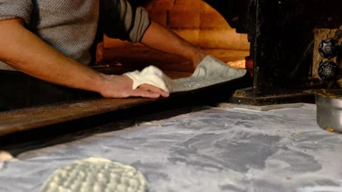 Traditional bread making in stone oven Stock Footage 228070370
