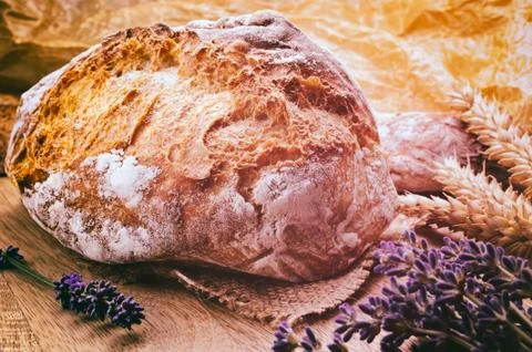 Traditional bread in rustic setting Stock Photos