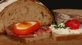 traditional bread urbrot with ham fried egg in paprika coat and cream cheese 4k or 4k+ Resolution