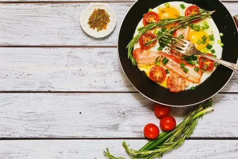 Traditional breakfast based on fried eggs flatlay Stock Photos