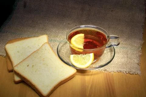 Traditional breakfast Lemon tea bread toast invigorating morning home comfort re Foto stock