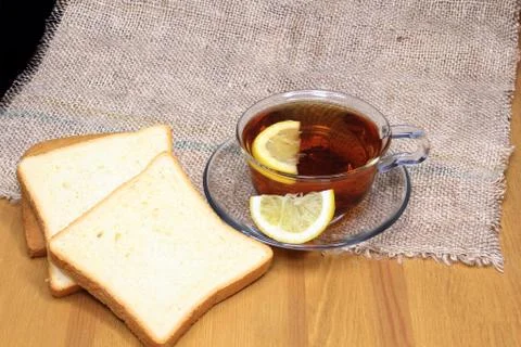 Traditional breakfast Lemon tea bread toast invigorating morning home comfort re 스톡 사진
