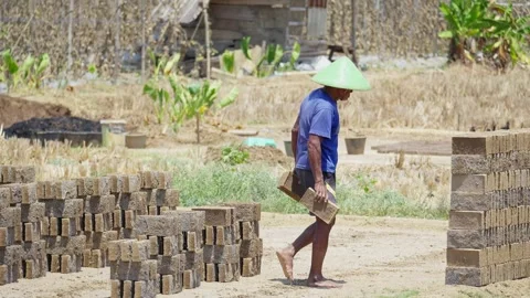 Traditional Brick Workers Making Clay Bricks Stock Footage 345618792