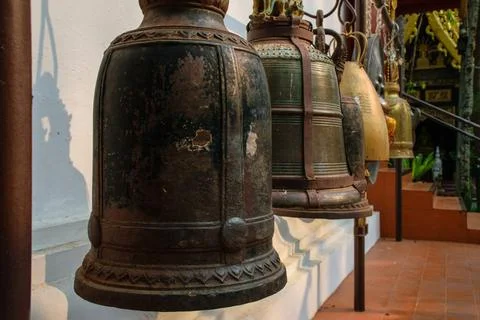 Traditional Bronze Bells At Buddhist Temple in Chiang Rai Traditional Bron... Stock Photos