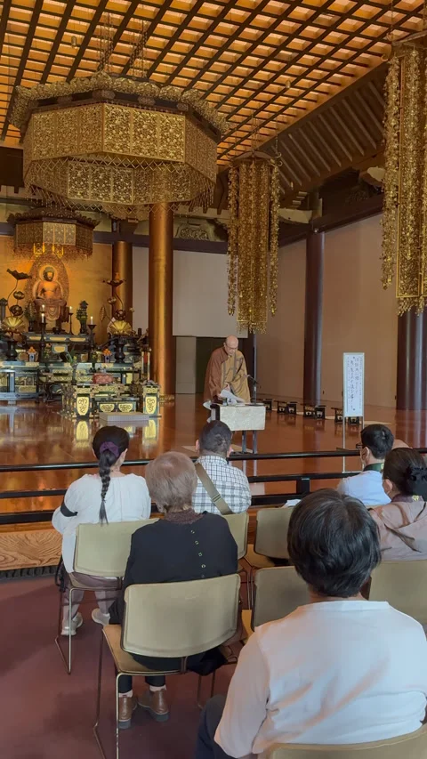 A traditional Buddhist religious ceremony inside the historic Zojoji Temple Stock Footage 340663537