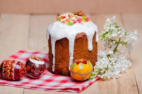 The traditional cake for Easter. Rustic Still Life Easter Cake with Egg and f Stock Photos