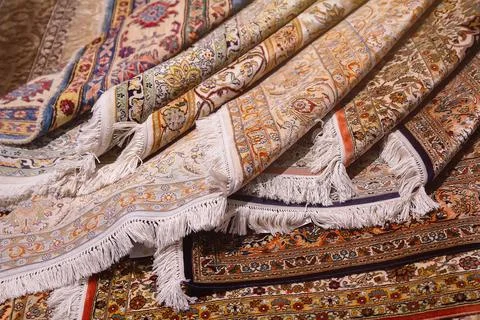 Traditional carpets displayed in Middle Eastern shop Stock Photos