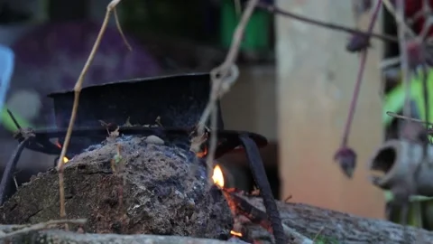 Traditional Cast Iron Pan Over Open Fire in Thai Countryside Stock Footage 338364191