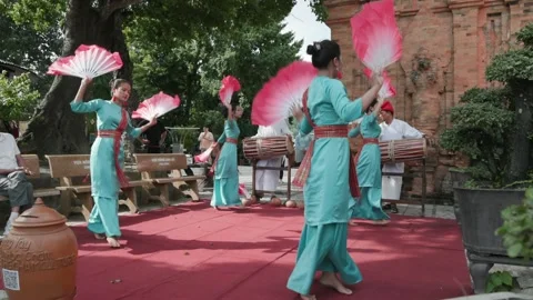 Traditional Cham dancers perform with fans and drums in Nha Trang, Vietnam Stock Footage 333935908