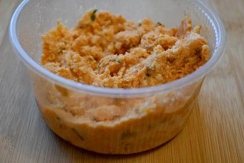 Traditional cheese spread in container close-up with copy space Stockfoto's