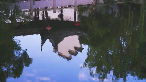 Traditional Chinese Architecture Reflected in Calm Village Water Canal Stock Footage 342003430