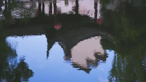 Traditional Chinese Architecture Reflected in Calm Rippling Pond Water Surface Stock Footage 342003454