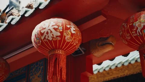Traditional chinese red lanterns decorating temple eaves Stock Footage 343710843