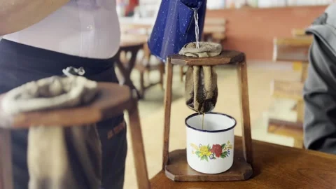 A Traditional “Chorreador” Coffee Maker Steeps Coffee in a Costa Rican Café Video stock 243224145