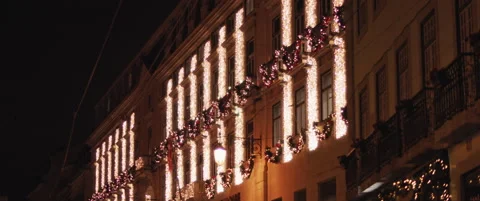 Traditional Christmas decorations on facades of old medieval building in Lisb Stock Footage 141367053
