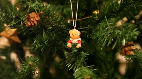 Traditional Christmas tree, Teddy bear decoration, sparkling lights, holiday Stock Footage 41381084