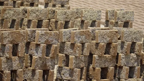 Traditional Clay Brick Making and Sun Drying Process Stock Footage 345618878