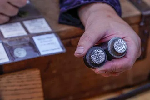 Traditional coin making process. Two metal stamps for minting ancient coins 스톡 사진