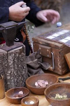 Traditional coin making process. Two metal stamps for minting ancient coins Stock Photos