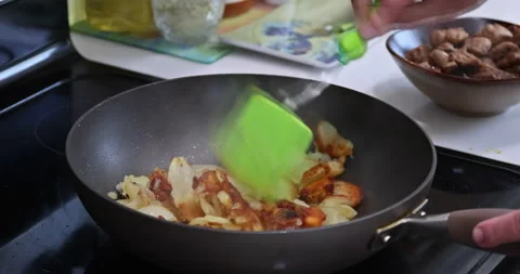 Traditional cooking technique involves r... | Stock Video | Pond5