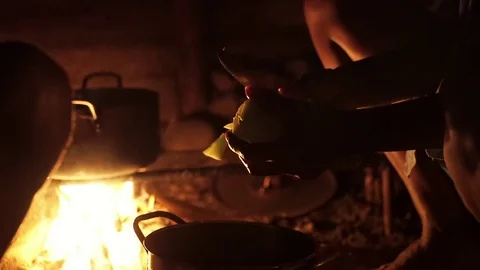 Traditional cooking using fire in Vanuatu village Stock Footage 76547087