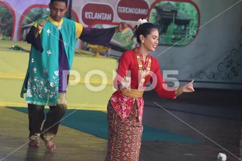 Traditional dance performance in Malacca city by local dancers men and women Stock Photos