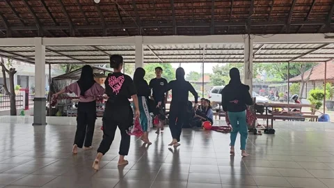 Traditional Dance Practice in an Open Pavilion Atmosphere Stock Footage 292100813