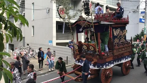 Traditional Dashi float parading during Akasaka Hikawa Matsuri in Tokyo Stock Footage 340856678