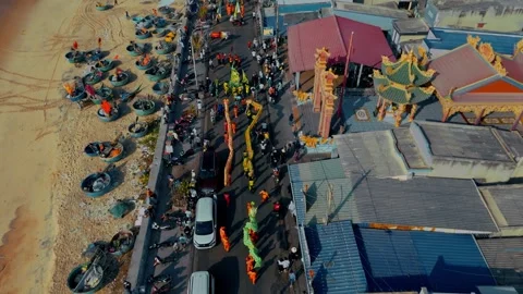 Traditional Dragon Dance on Beach with Basket Boats - Aerial Shot Stock Footage 334330000
