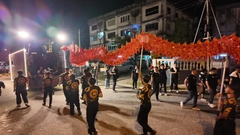 Traditional Dragon Dance Performance at Kampar Seng Fatt Temple Stock Footage 345444173