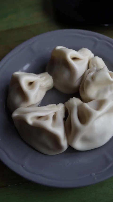 Traditional dumplings on plate Stock Footage 330903762