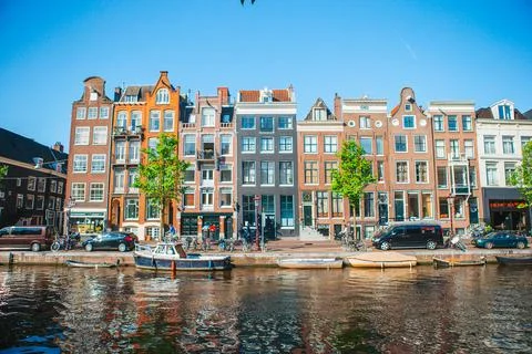 Traditional dutch medieval houses in Amsterdam capital of Netherlands Stock Photos