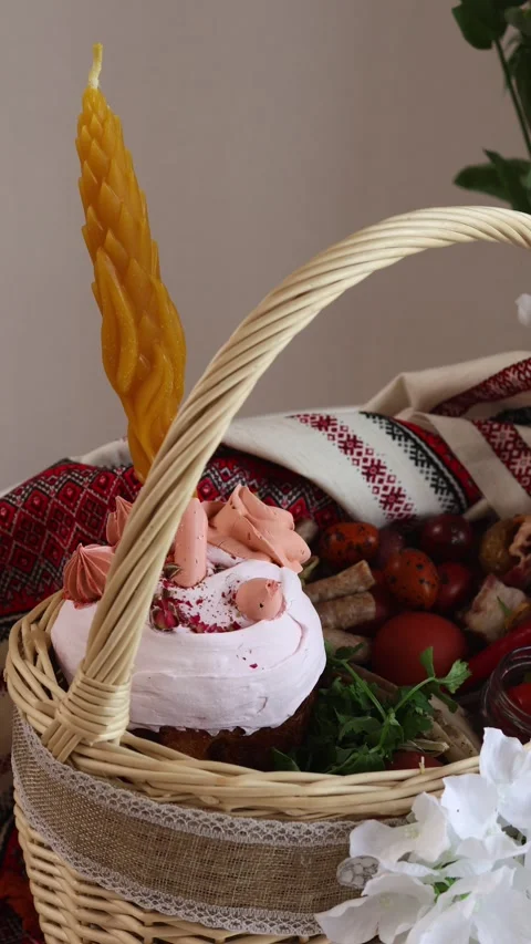 Traditional Easter basket filled with blessed foods such as Easter bread Stock Footage 306152174