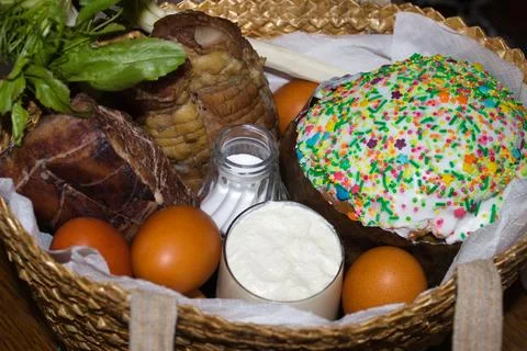 Traditional Easter Basket Filled with Festive Foods Stock Photos