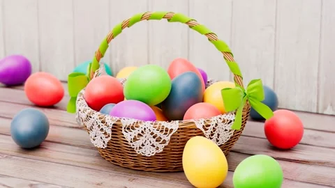 Traditional Easter basket full of cloured eggs while spring celebration. Stock Footage 158247433