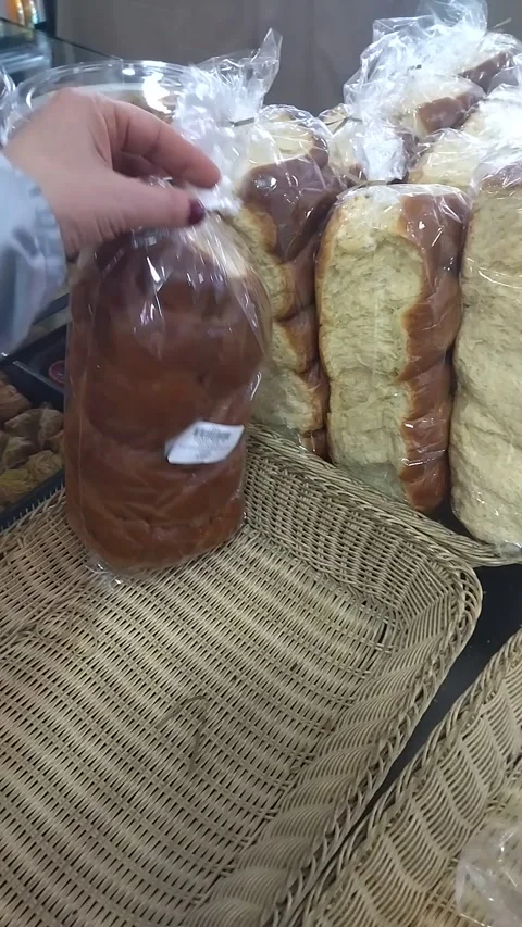 Traditional Easter bread, brioche, in a bakery, packaged for gift Stock Footage 305900194