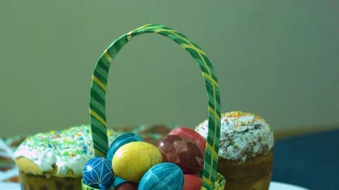 A traditional Easter cake and a basket with Easter eggs Stock Footage 74821559