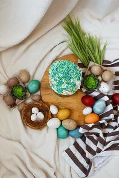 Traditional Easter cake and painted eggs on white background. Space for text Stock Photos