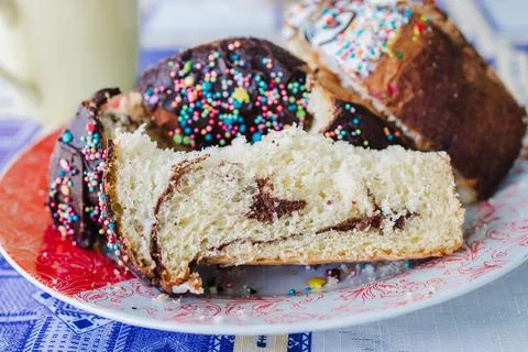 Traditional Easter cake cut into chunks on a plate Stock Photos