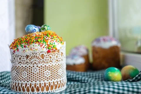 Traditional Easter cake with glace icing and painted easter eggs.Rustic style Stock Photos