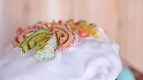 A traditional Easter cake glazed and decorated with marmalade and candied fruits Stock Footage 105982359