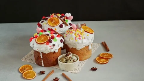 Traditional Easter Cakes decoreted with dried Fruits on Grey Background Stock Footage 236855333