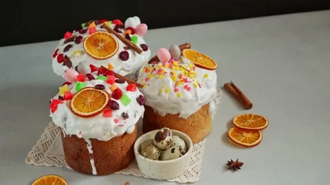 Traditional Easter Cakes decoreted with dried Fruits on Grey Background Stock Footage 236855359