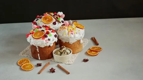 Traditional Easter Cakes decoreted with dried Fruits on Grey Background Stock Footage 236855383
