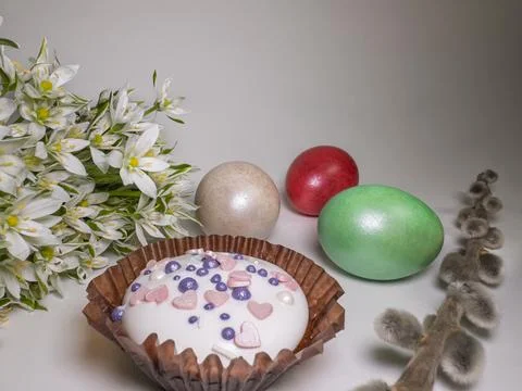 Traditional Easter composition with a decorated cupcake Stock Photos